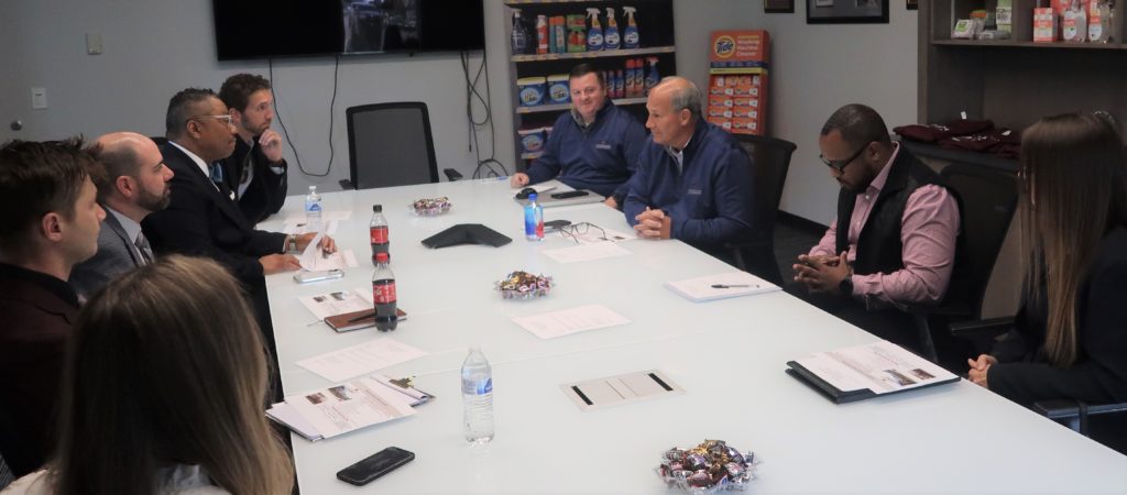 Representatives from Jeff Ruby's meet with leaders from Nehemiah Manufacturing and Cincinnati Works